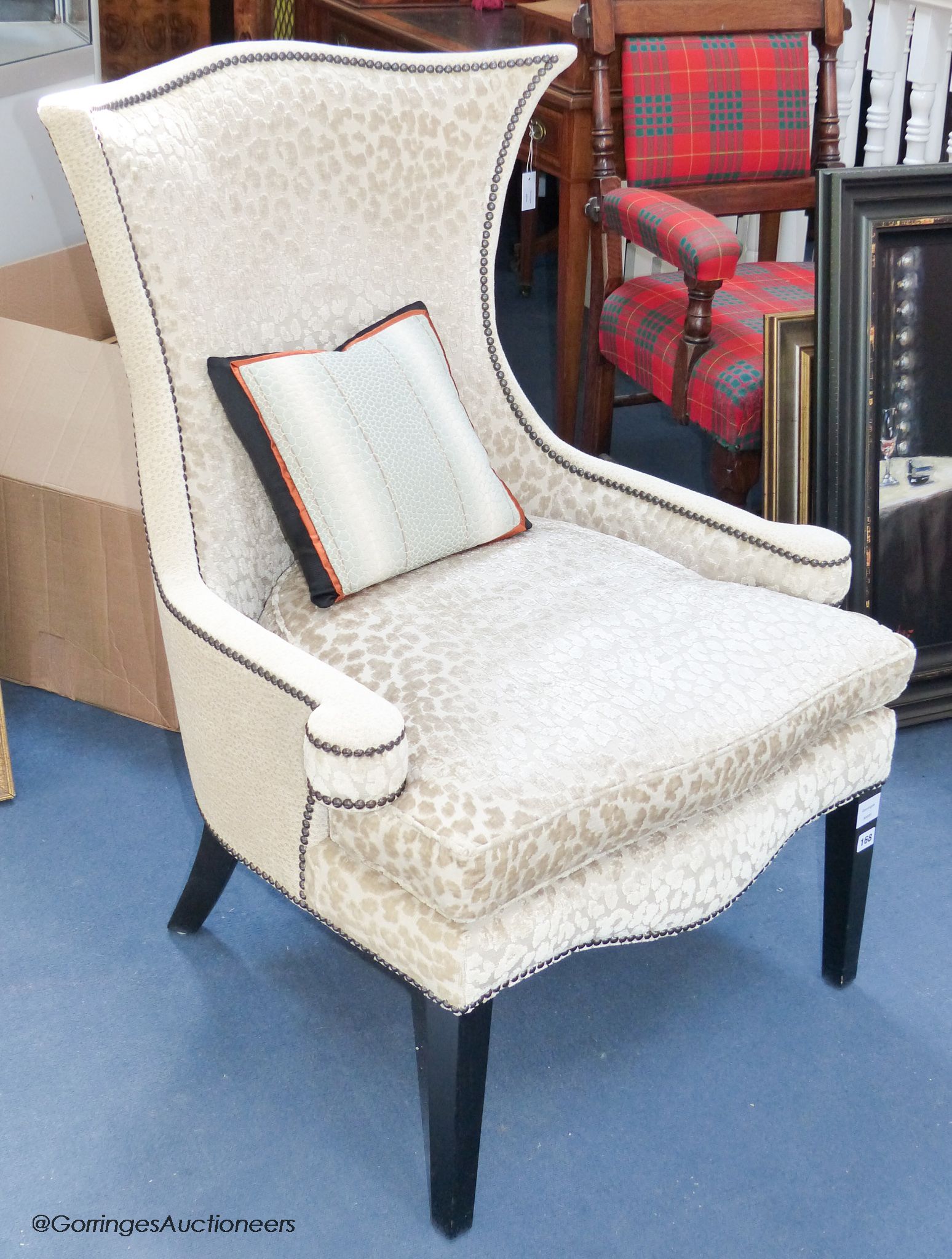 A contemporary upholstered armchair
